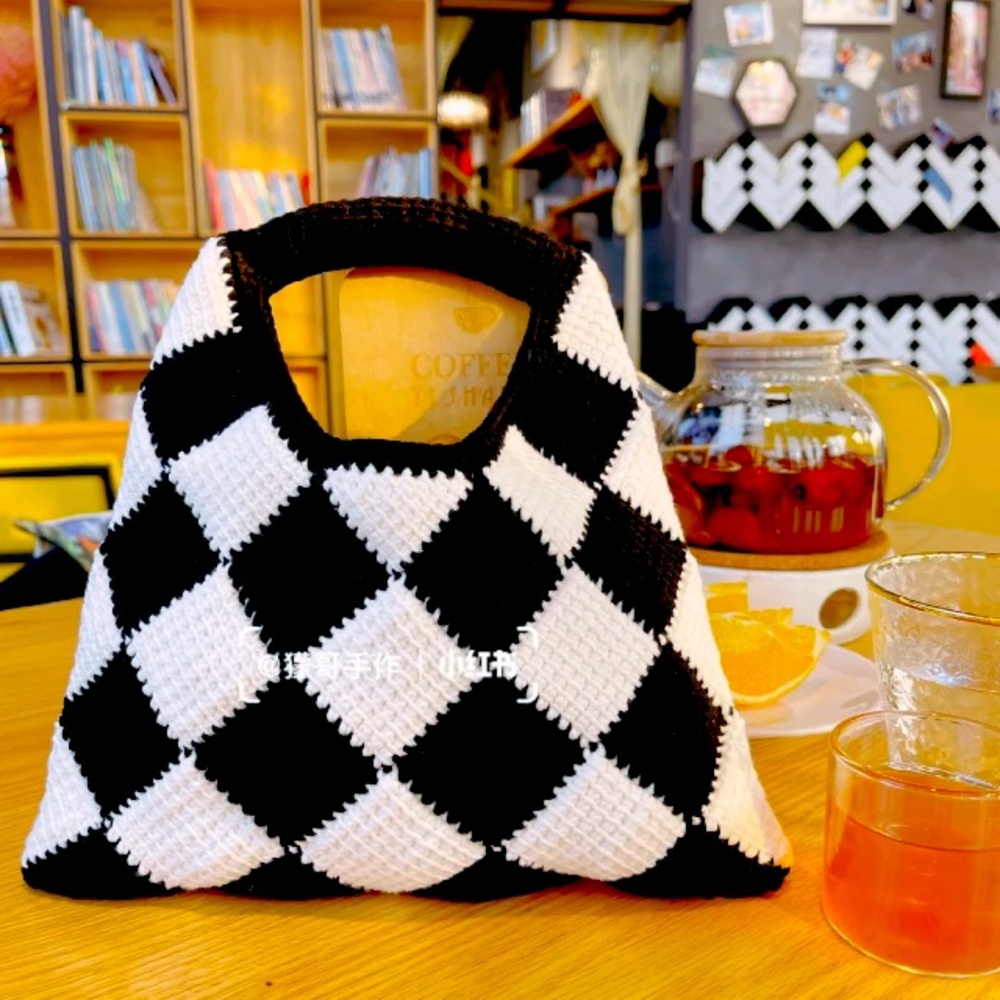 Black and white crocheted bag